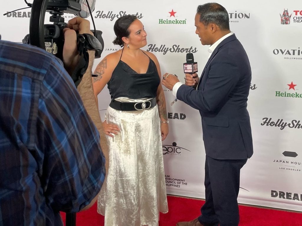 Lisette Alvarez representing Stormfire Productions at the 2022 HollyShorts Film Festival. Our flagship show “KALILA STORMFIRE’S ECONOMICAL MAGICK SERVICES” was nominated for Best Podcast at the Academy Award-eligible HollyShorts Film Festival.